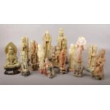 A good collection of Chinese carved soapstone figures. Some with damage.