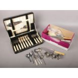 An assortment of flatware. To include a boxed fish knife set and servers in presentation box,