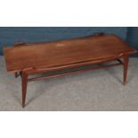 A teak G-Plan style coffee table with under tier. (39cm x 119cm)