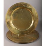 Six large brass plates. Diameter 35cm.