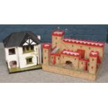 A Vintage Dolls House and Fortress, with figures.