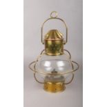 A vintage brass/copper ships lantern with brass handle. 35cm h.