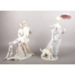Two large Lladro figures. Comprising of a lady with dog and umbrella (H:39cm) & a two figured