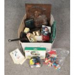 A box of collectables. Includes wooden plaque, PHQ cards, Planet Of The Apes mugs etc.
