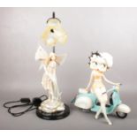 A boxed limited edition of Betty Boo on a scooter, together with a fairy figured lamp. Betty Boo: