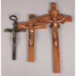Three Crucifixes of Jesus on the Cross, with plaques depicting INRI - translating to "Jesus the
