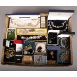 A box of costume jewellery. Includes vintage examples, bangles, necklaces etc.