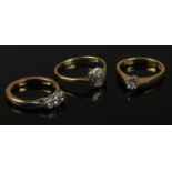 Three vintage 18ct gold and diamond rings. 9.52g.