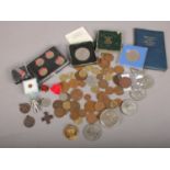 A collection of British & foreign coins. To include commemorative coins Churchill 1965, Festival