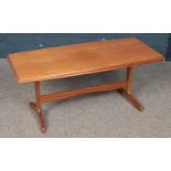 A Small Teak Coffee Table. Dimensions: H = 43cm, W = 97cm, D = 45cm.