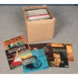 A box of LP records and 78s. Includes Elvis, Frank Sinatra, Country etc.