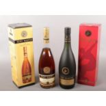 Two boxed full & sealed bottles of Remy Martin fine champagne cognac. Including Grand Cru example,