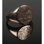 A 9ct gold signet ring with monogrammed panel. Size P. 4.86g. Looks to have been resized.