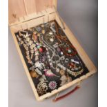 A Winsor & Newton wooden box with contents of vintage costume jewellery.