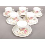 An 18 Piece Duchess Bone China Tea Set Depicting Roses. Condition Good, No chips or cracks.