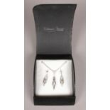 A 9ct White Gold and Diamond Pendant Necklace (on Silver Chain) and Matching Earrings