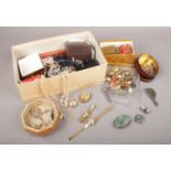 A group of costume jewellery. Beads, necklaces, brooches etc