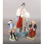 Three continental porcelain figures.