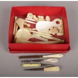A Collection of Mostly Ivory items. To Include a small Ivory Handled Fruit Knife and Corkscrew