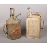 Two Vintage Paraffin Cans. Comprising of:- An Aladdin Pink Paraffin Can and a Valor Paraffin Can (