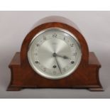 A Mahogany Bentima Mantel Clock. Condition Good, Chimes Quarterly but does not run.