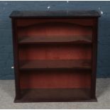 A mahogany open bookcase. (83cm x 80cm)