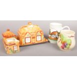 A Westminster Ceramics Old English Cottage Ware Butter Dish, Milk Jug and Lidded Sugar Bowl, along