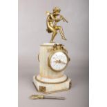 An Alabaster mantle clock with gilt metal boy with pipes. Comes with key. H: 25cm, W: 11cm.