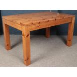 A Pine Rectangular Dining Table. Dimensions: L = 137cm, W = 86cm.