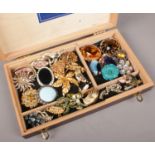 A case of 26 costume jewellery brooches.