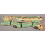 A TN Nomura tin plate and friction drive model of a snake train, comprising of four various