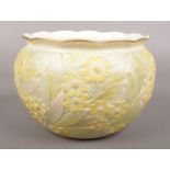 A Royal China Works Worcester Bowl depicting Yellow Daisies. Markings for Grainger and Co. and the