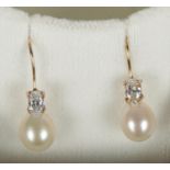 A pair of 9ct gold cultured pearl earrings.