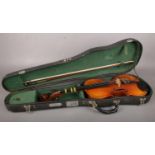 A cased Chinese Skylark Violin with bow. Comprising of a P & H London bow. L: 57cm, W: 22cm.