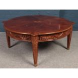 A circular mahogany fan patera coffee table. (48cm x 106cm)