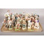 A tray of mostly ceramic figures. Including Capodimonte style examples, etc.