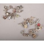 Two silver curb link charm bracelets with a selection of charms. House, Pram, Stork, Hedgehog,