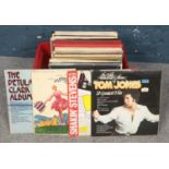A Large collection of records. To include albums from: Tom Jones, Shakin Stevens, The Sound of Music