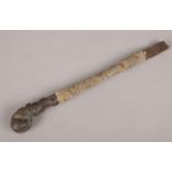 An antique wooden riding crop with carved coiled snake pommel. (33cm)