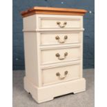 A part painted pine topped bedside chest of drawers. H:69cm, W:45, D:34cm.