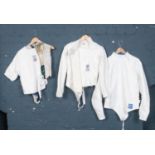 A fencing outfit by Leon Paul London & Uhimann. Comprising of a white tunic, breeches, glove and