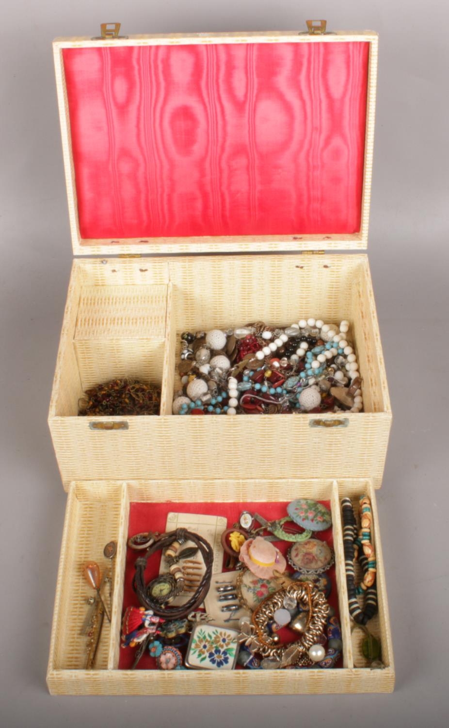 A Musical Jewellery Box with Costume Jewellery Contents. Mechanism of Music Box will need