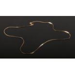 A child's 9ct gold flat link necklace. 0.69g.