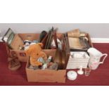 Four boxes of miscellaneous. To include a large water jug, a teddy bear and a spindle lamp etc.
