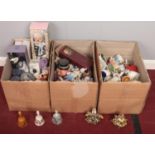 Three boxes of miscellaneous. ceramic ornamental clowns & bells.