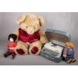 An assortment of toys. To include a large Harrod's bear, 1960's Petite Typewriter, Boyd's bear and a