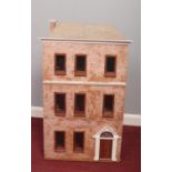 A vintage dolls house with a quantity of dolls furniture & accessories. (82cm height 45cm width 23cm