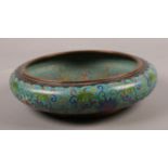 A Chinese cloisonné bowl. 26cm diameter. Spurious four character Ming mark to base.