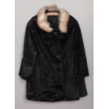 A vintage faux fur coat.