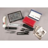 A group of collectables. Includes Parker, Sheaffer and Waterman pens, Cartier sunglasses case,